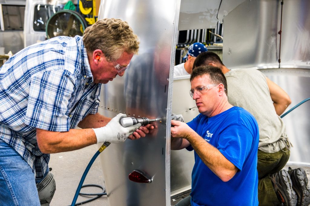 Airstream Two Employees Driving Rivets