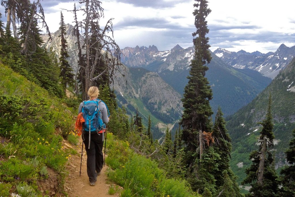 Image: 20150622-OkaWen-NF-Hiker-Descending-on-Maple-Pass-Trail-by-Natalie-Kuehler-1024x683.jpg