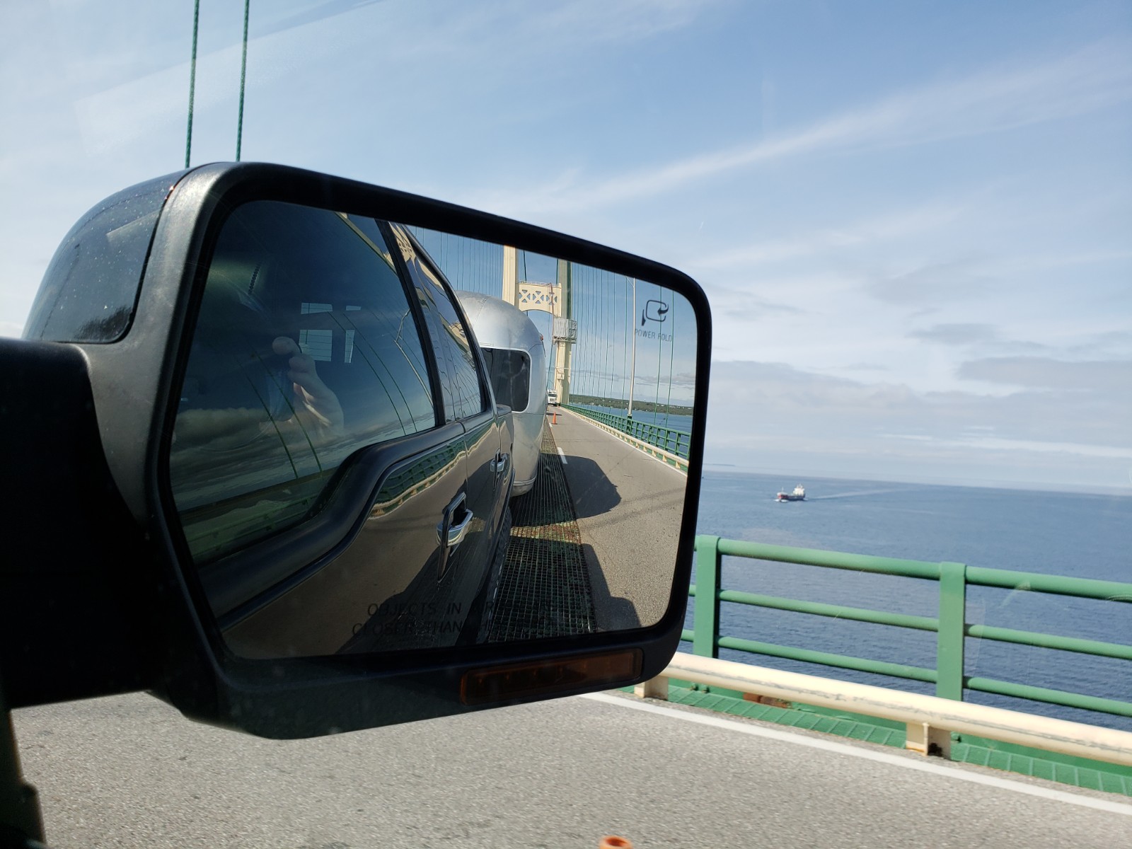 Airstream Travel Trailer in Rear View Mirror