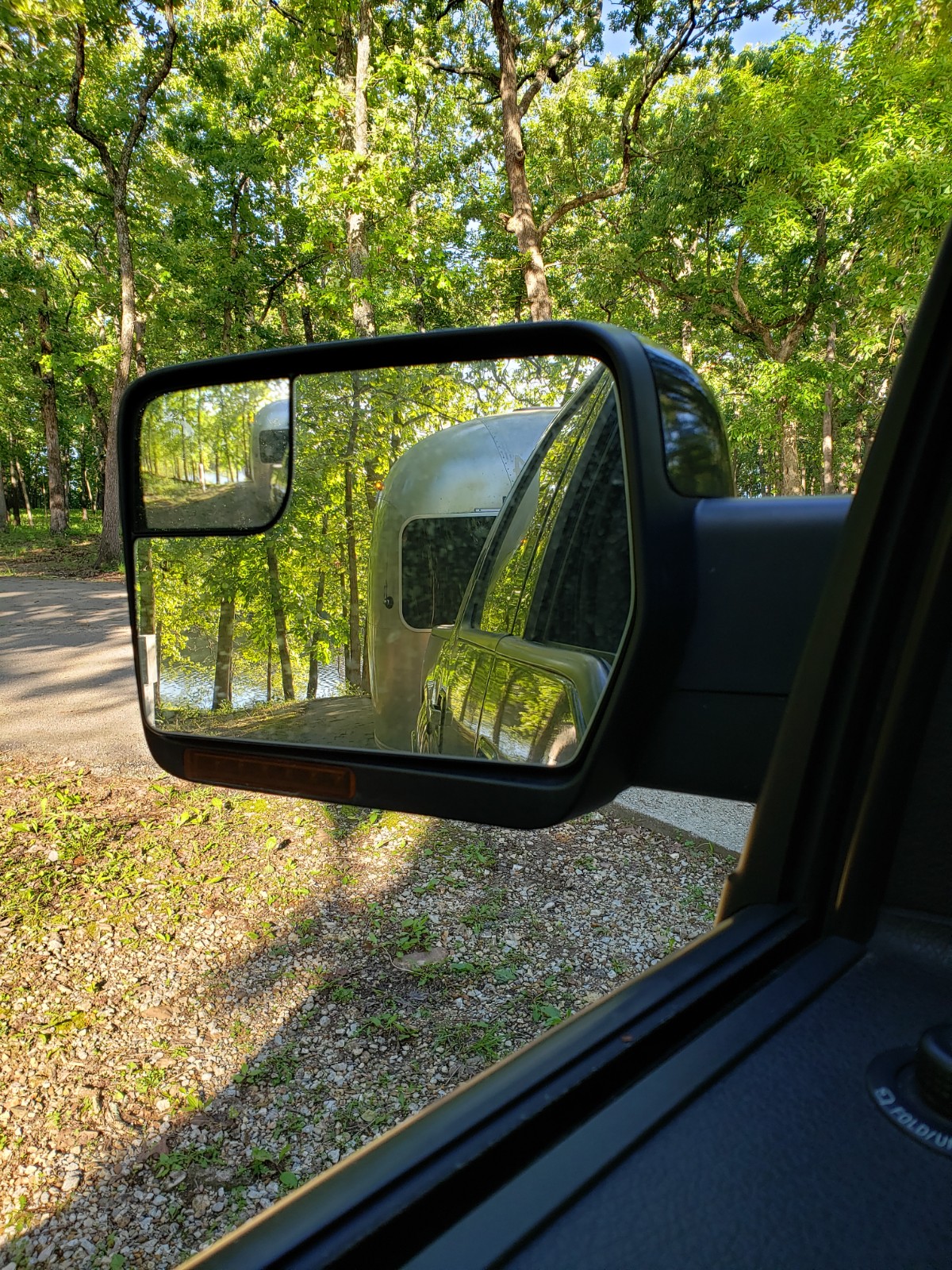 Airstream Travel Trailer in Rear View Mirror