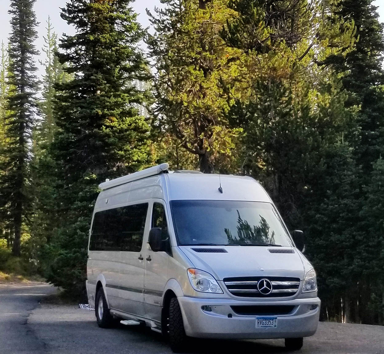 Airstream Interstate in a wooded National Park