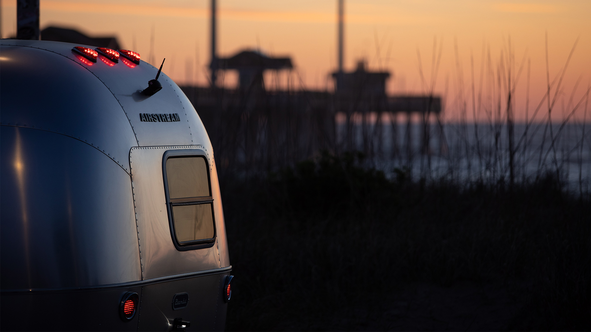 Airstream Bambi at Beach During Sunset
