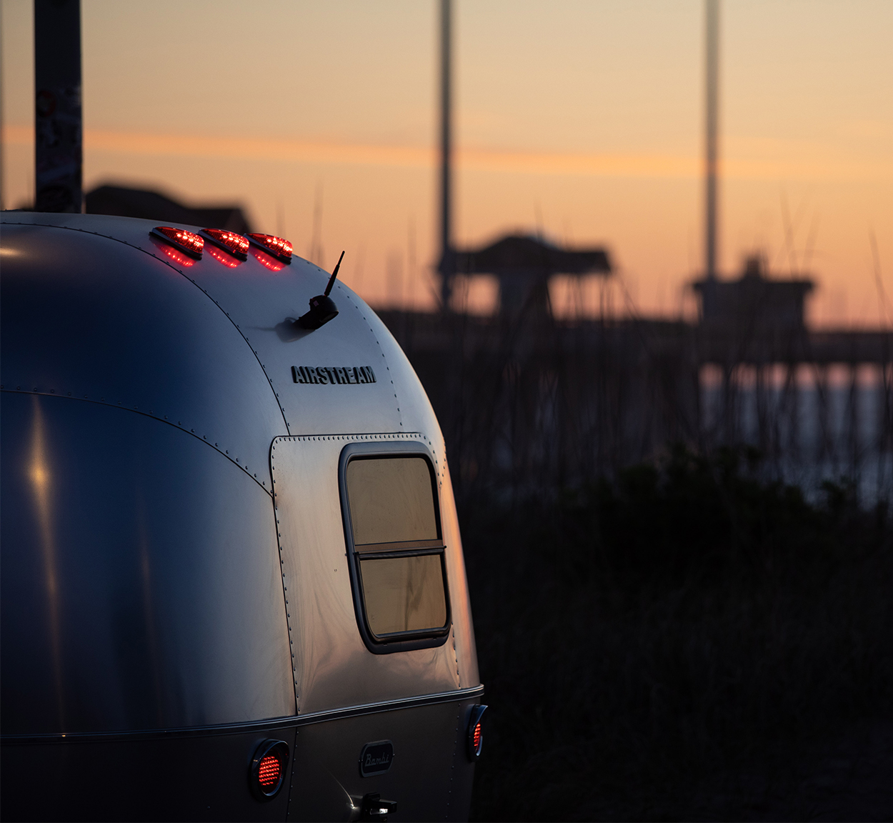 Airstream Bambi at Beach with Sunset