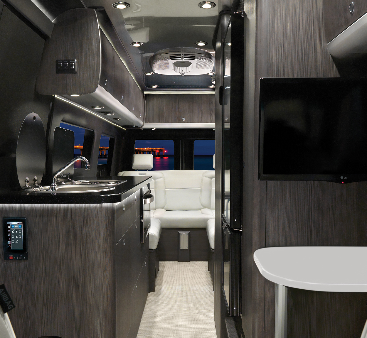 Airstream-Interstate-24-Power-Sofa-and-Convertible-Table-Header-2