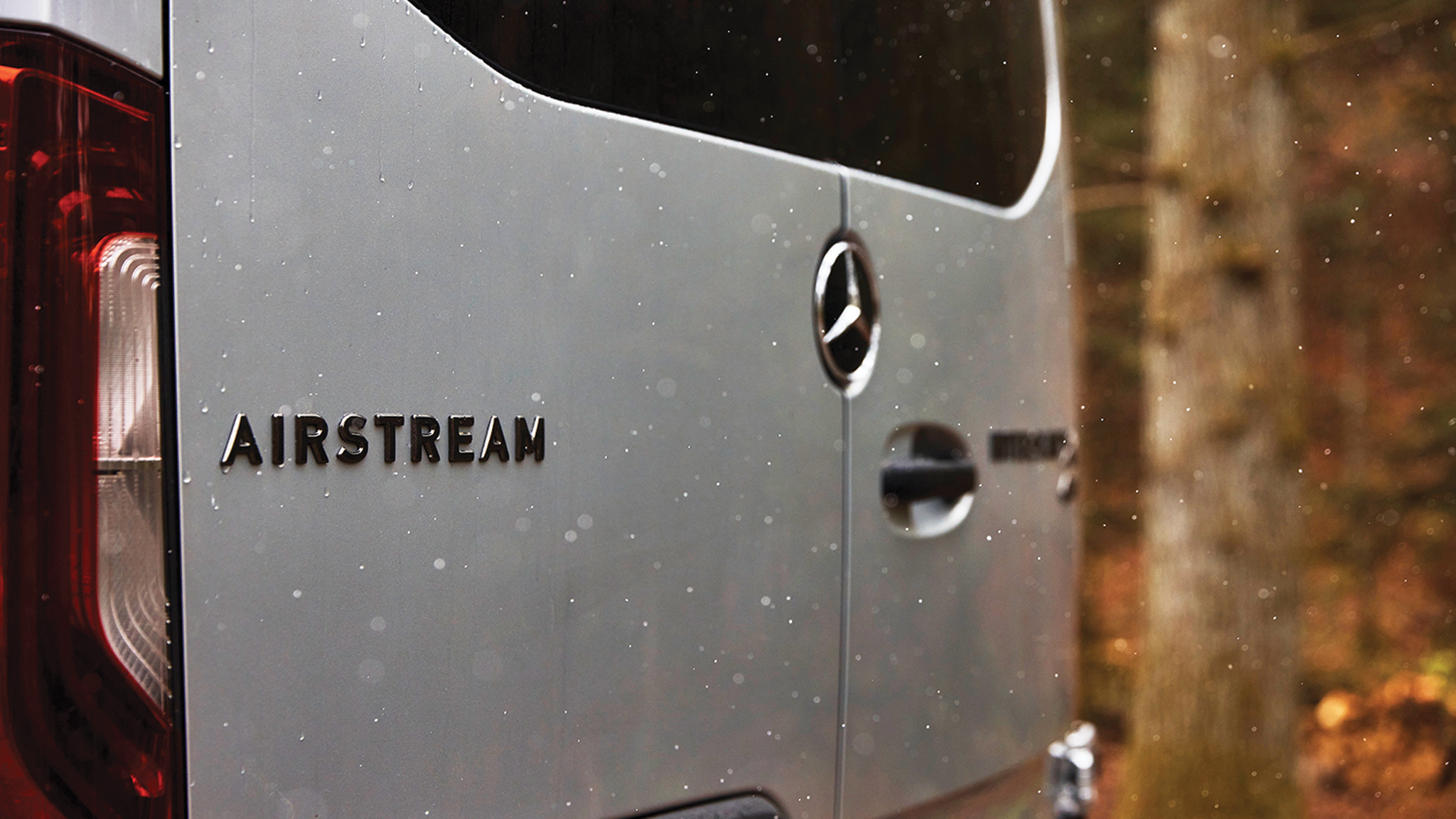 Airstream Interstate 24X Touring Coach in the woods