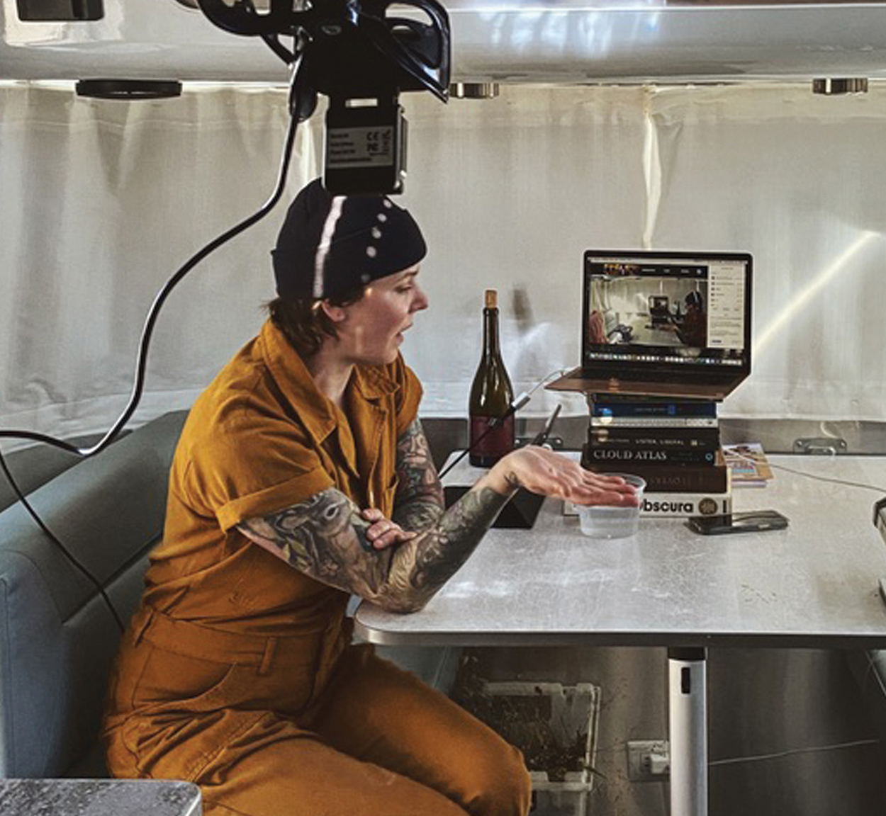 Iliana working inside an Airstream