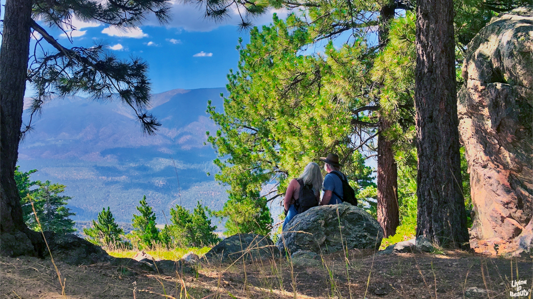 Carmen and Jim Beaubeaux looking at the beautiful mountains
