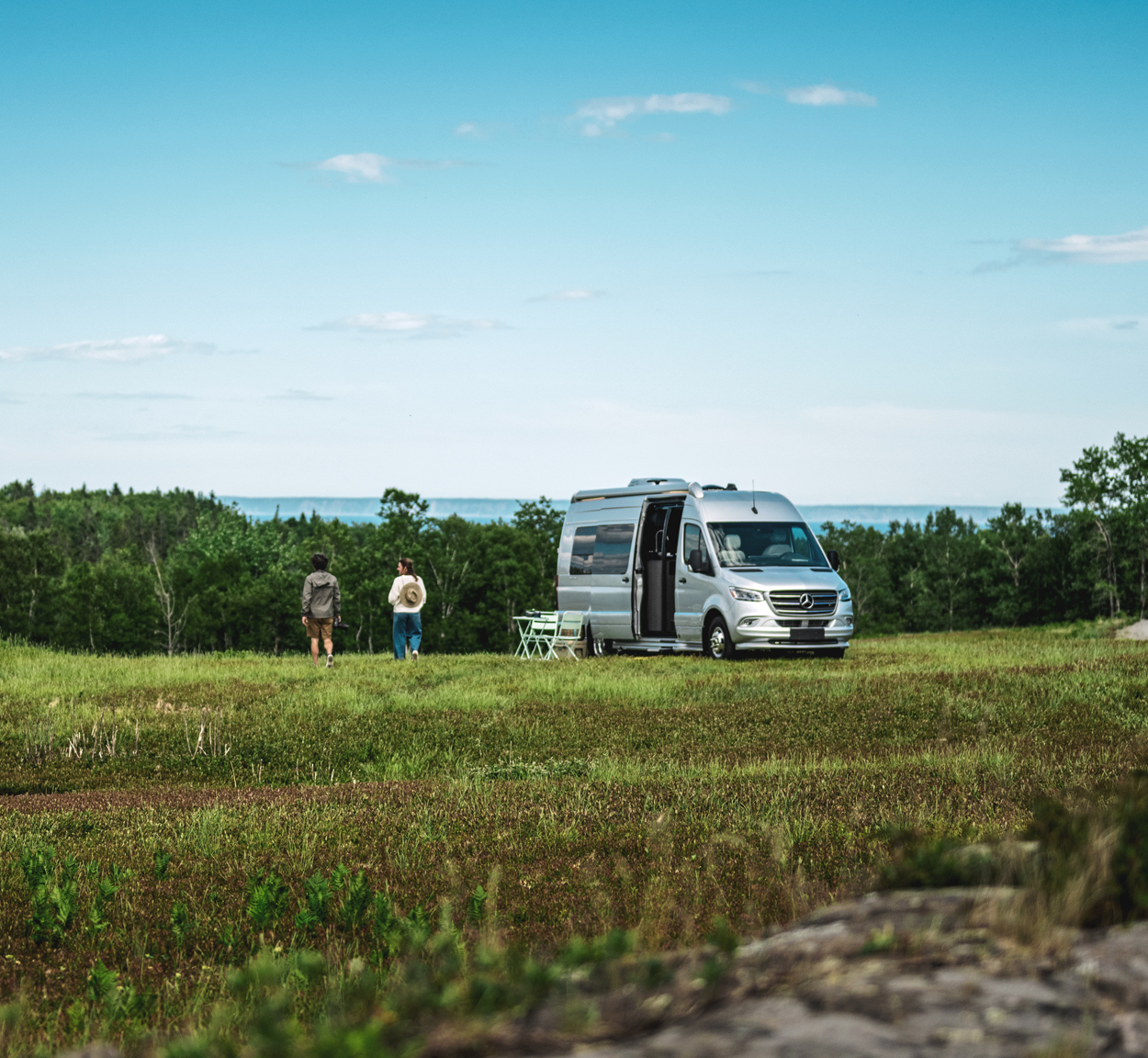 Airstream Interstate Class B RV sitting in the grass