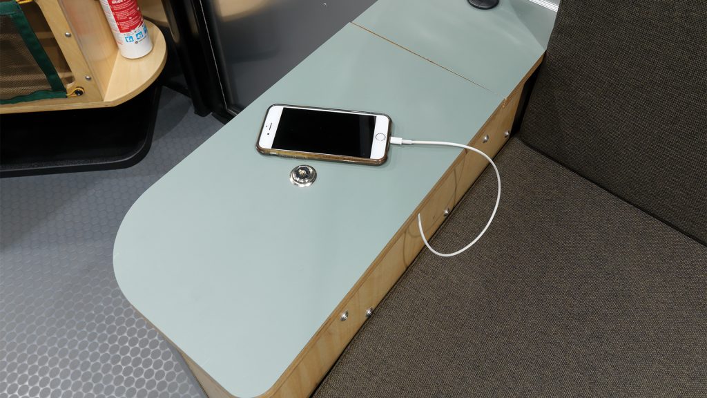 Airstream-REI-Co-op-Special-Edition-Basecamp-interior-lockable-compartment-with-wire-passthrough