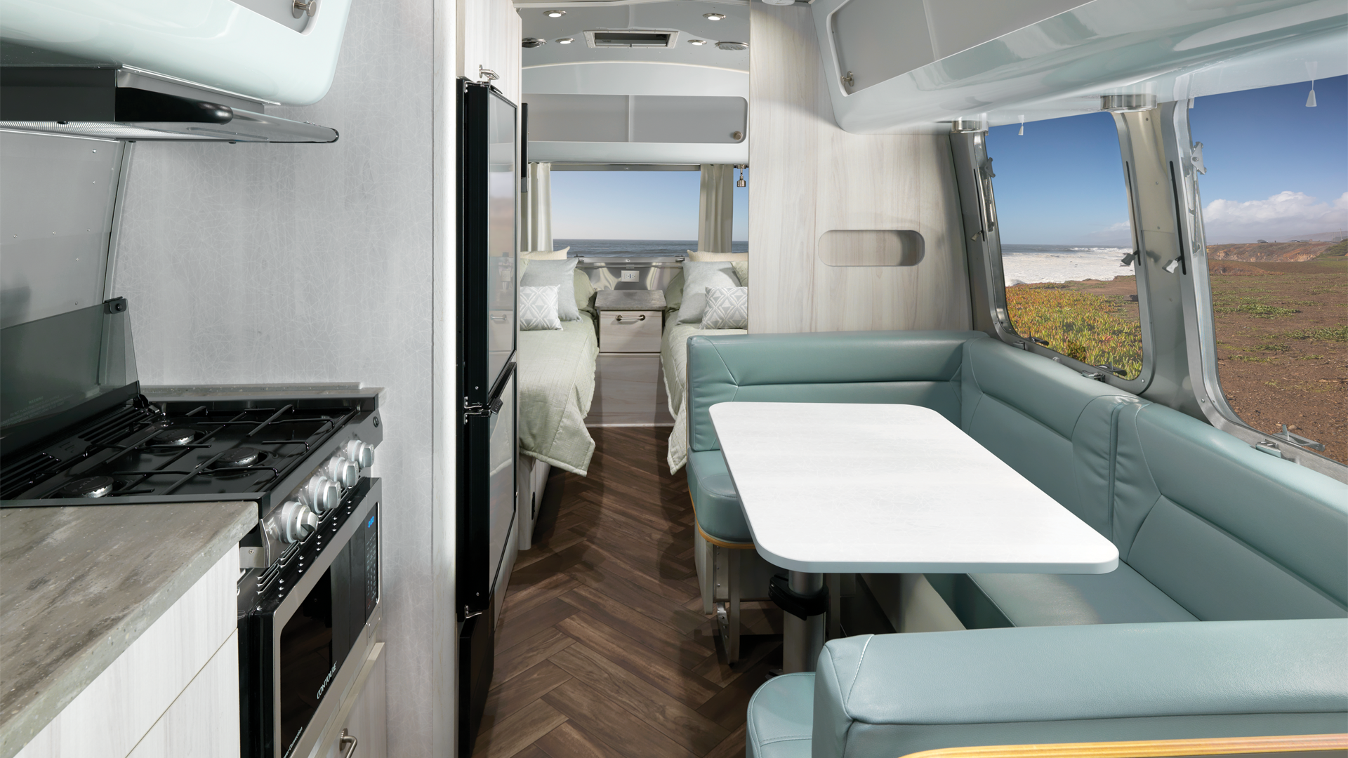 The International travel trailer interior looking from the back of the camper to the front.