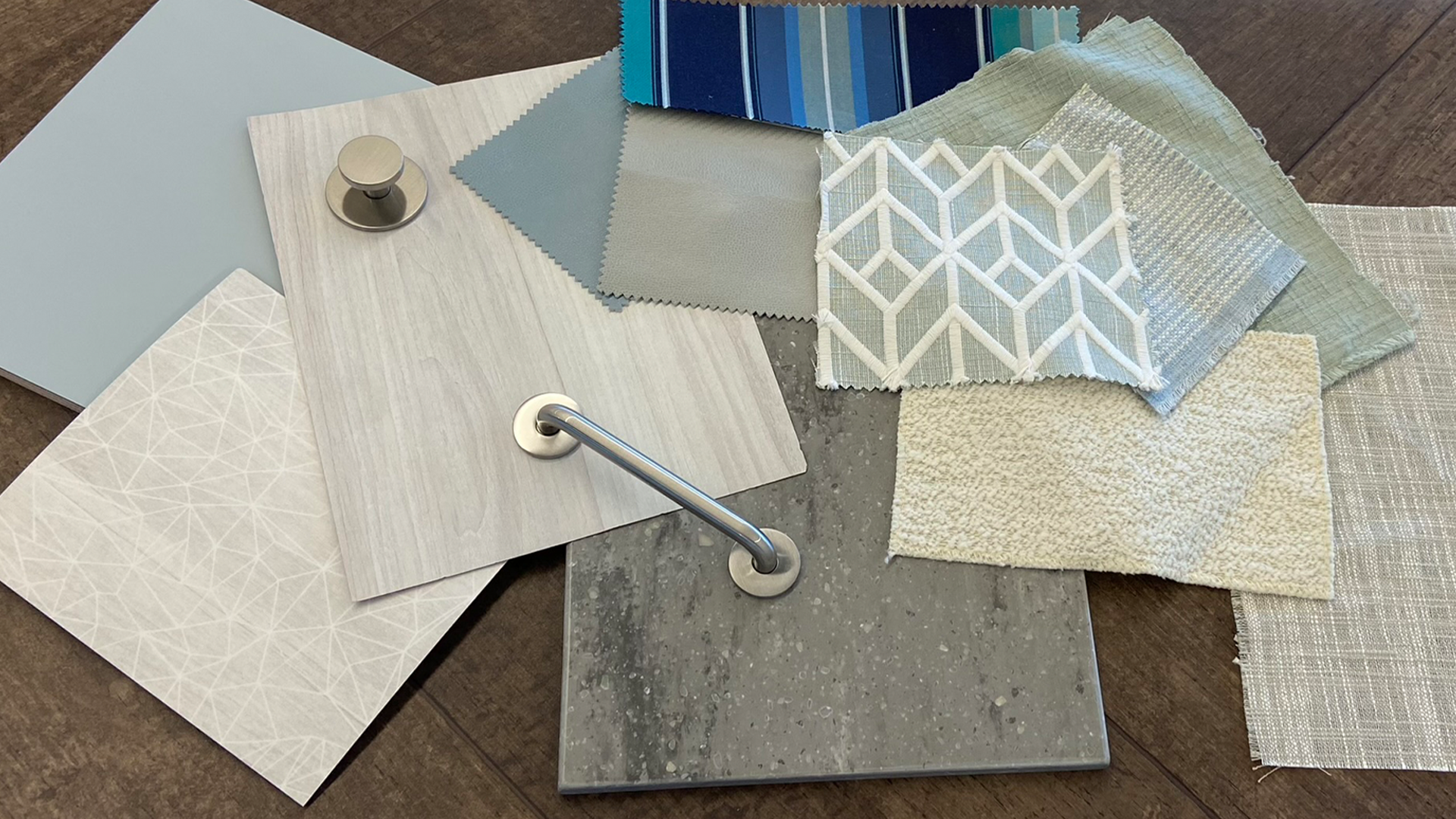 The decor swatches for the International travel trailer laid out on the table.