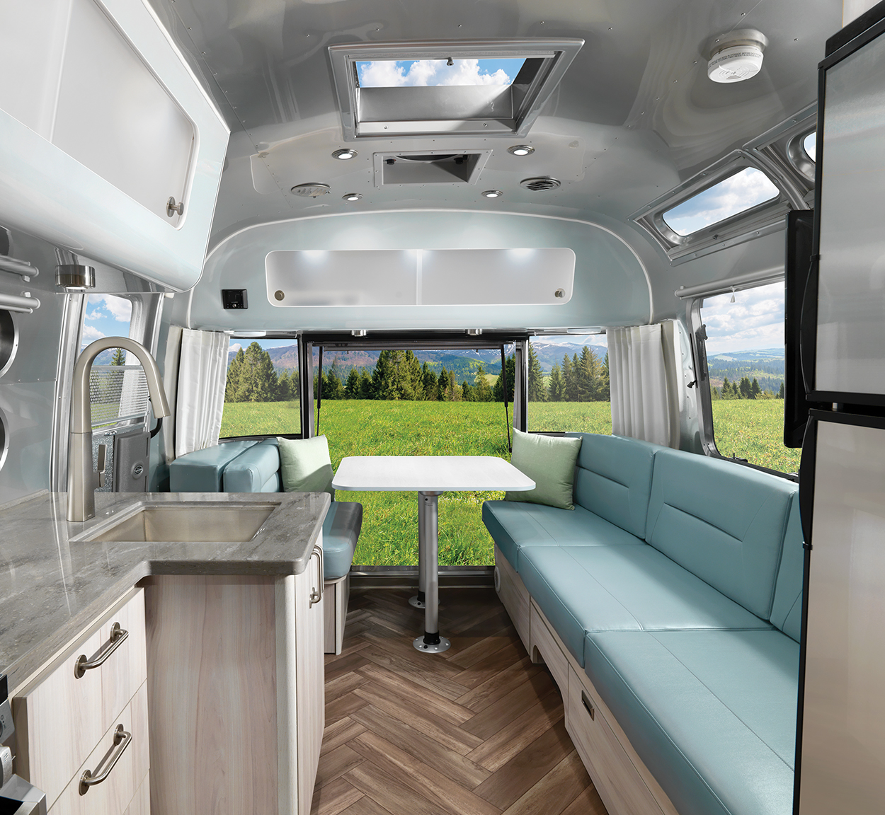 Airstream International Travel Trailer with the back hatch open.