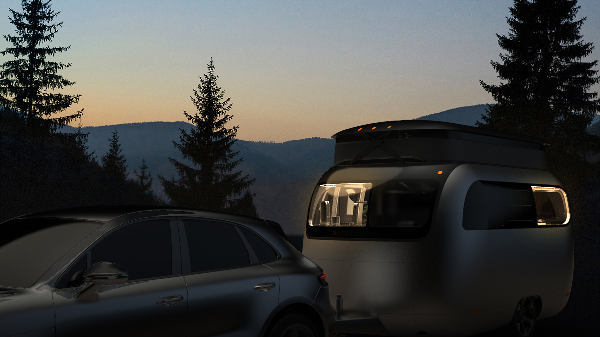 Airstream Studio F. A. Porsche Concept Travel Trailer sitting at a campsite at night.