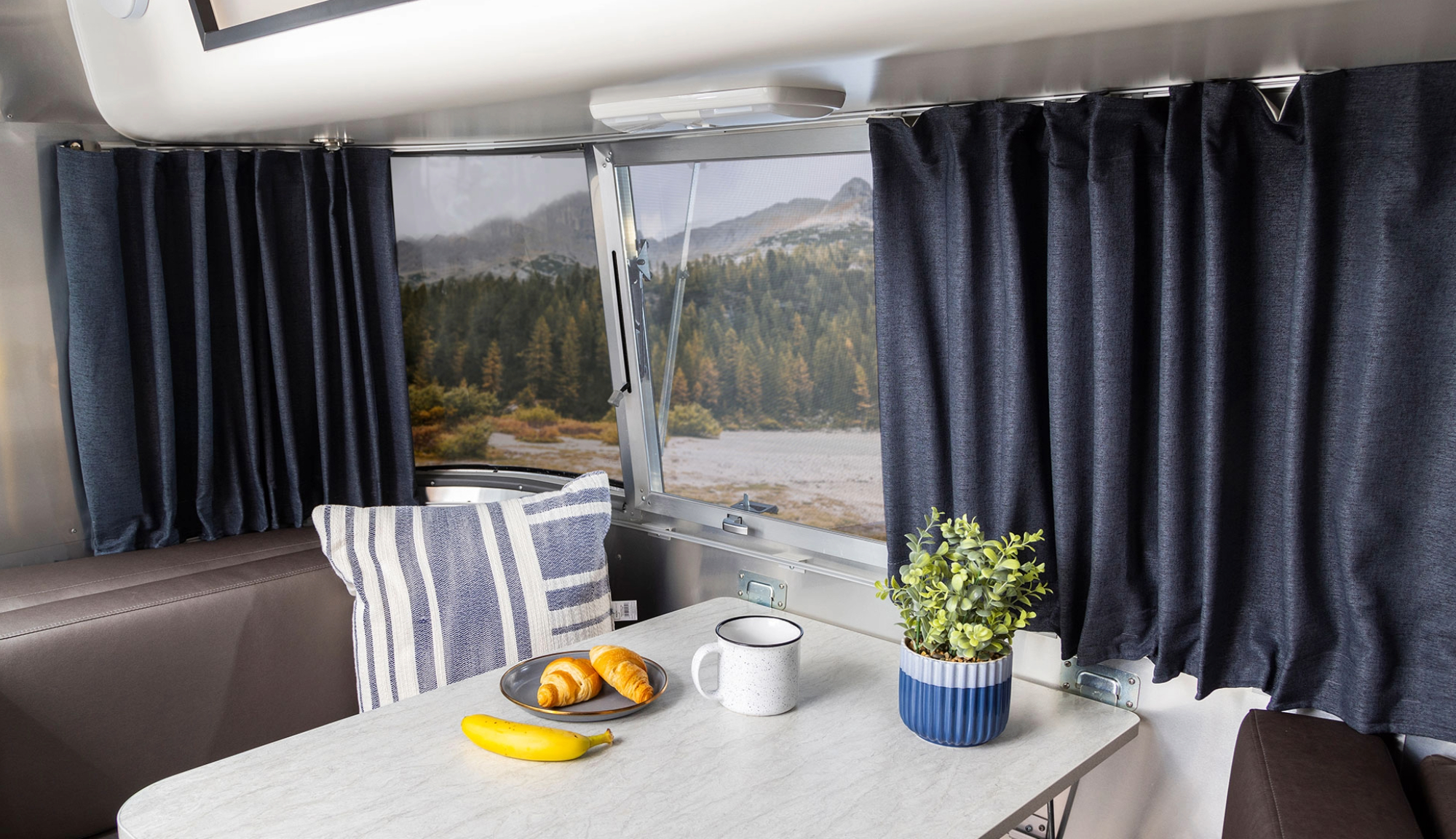 Denim color curtains at the dinnet from Airstream Supply Company 
