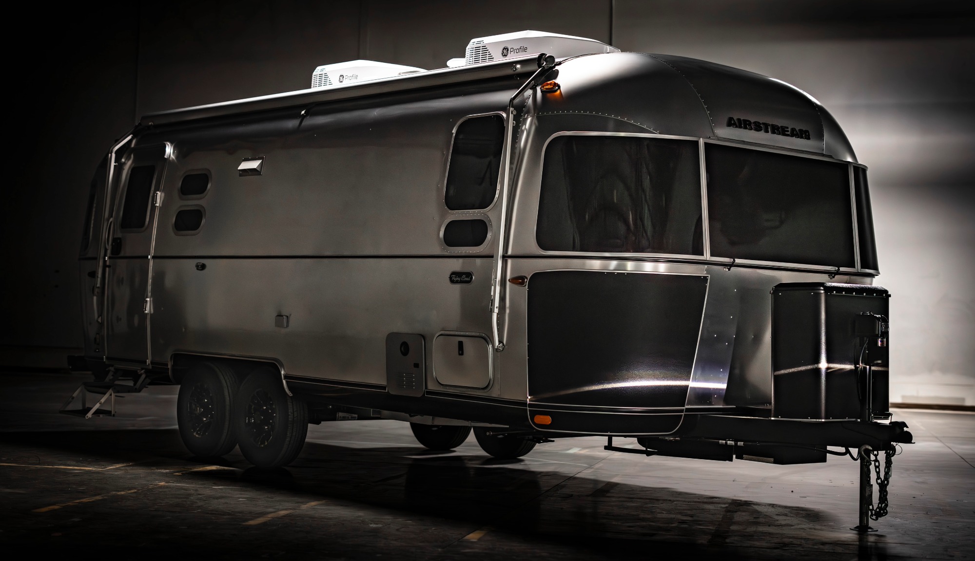 Exterior image of Airstreams Flying Cloud Travel Trailer in the Midnight Flamingo Upgrade