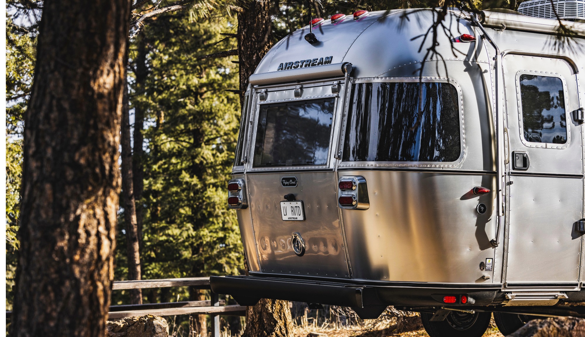 Exterior closeup of the Airstream Midnight Flamingo Flying Cloud 