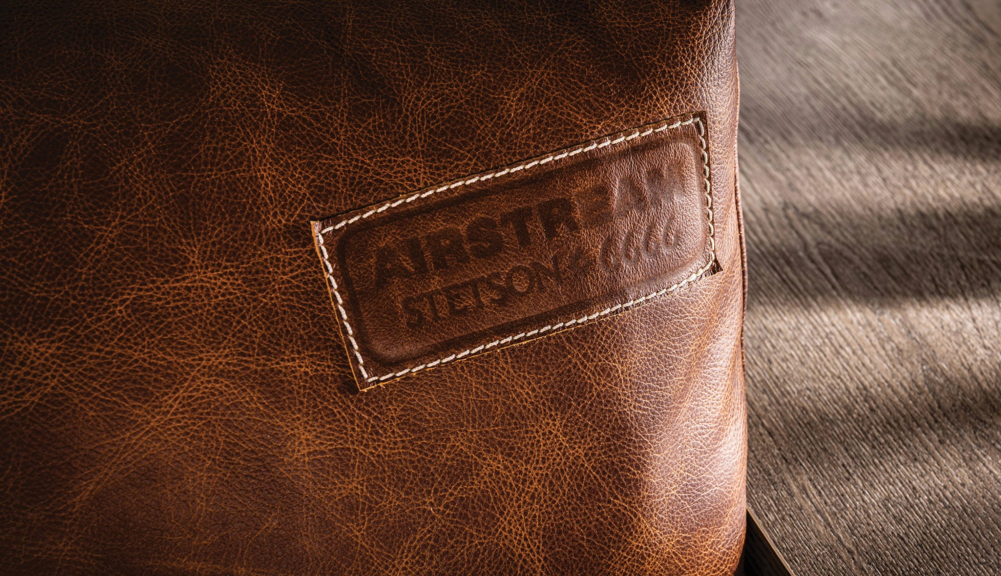 Closeup feature of the Genuine Semi-Aniline Leather Seating in Airstream's Stetson + 6666s Limited Edition Travel Trailer