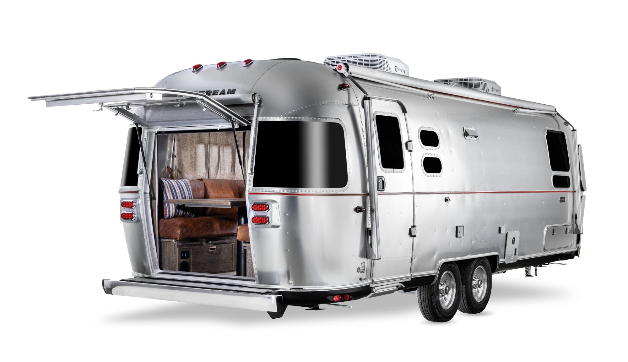 Exterior studio image of the Airstream Stetson + 6666s Limited Edition Travel Trailer rear with the back hatch open