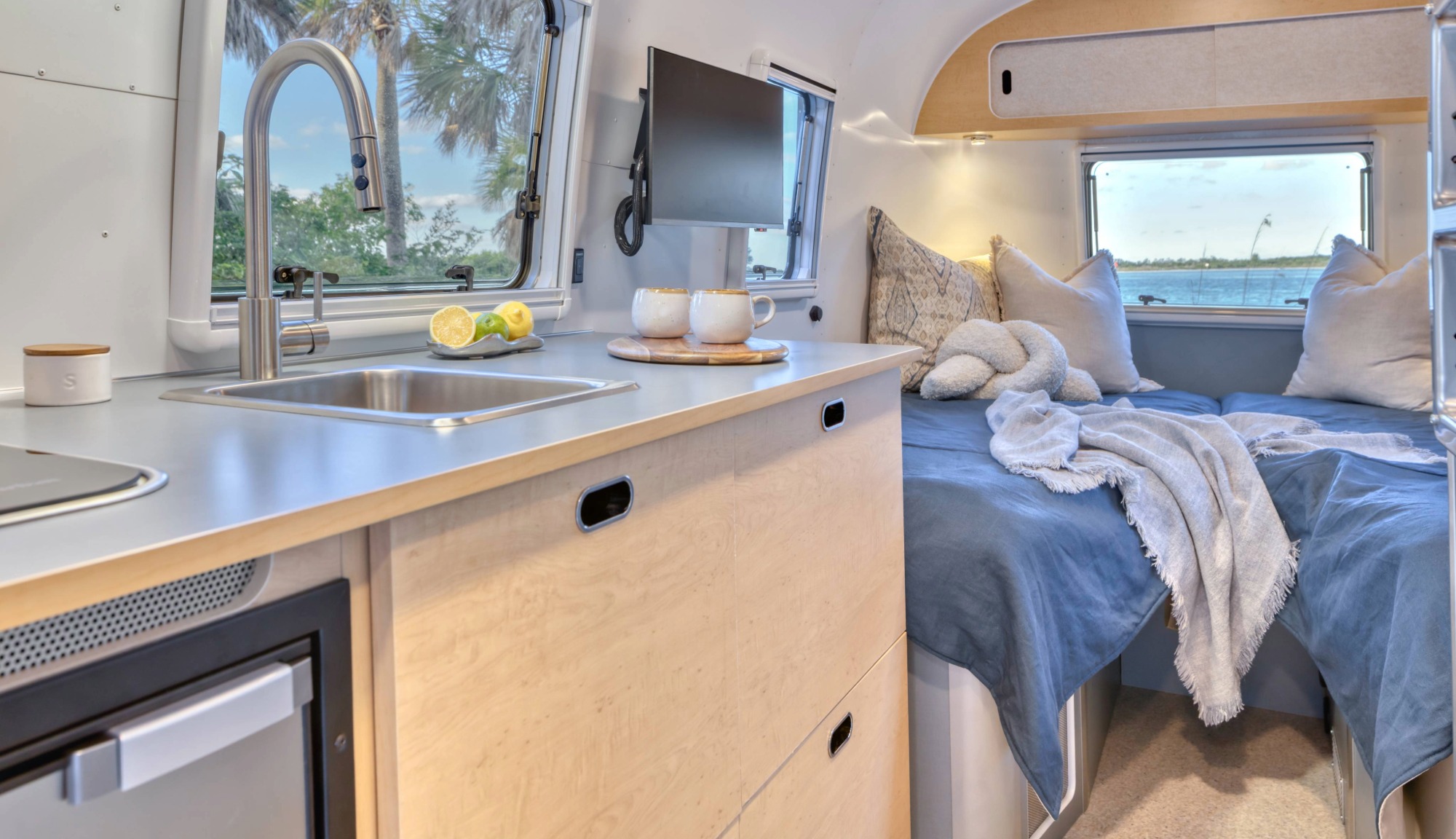 Interior feature of World Traveler Twin bed configuration and Galley