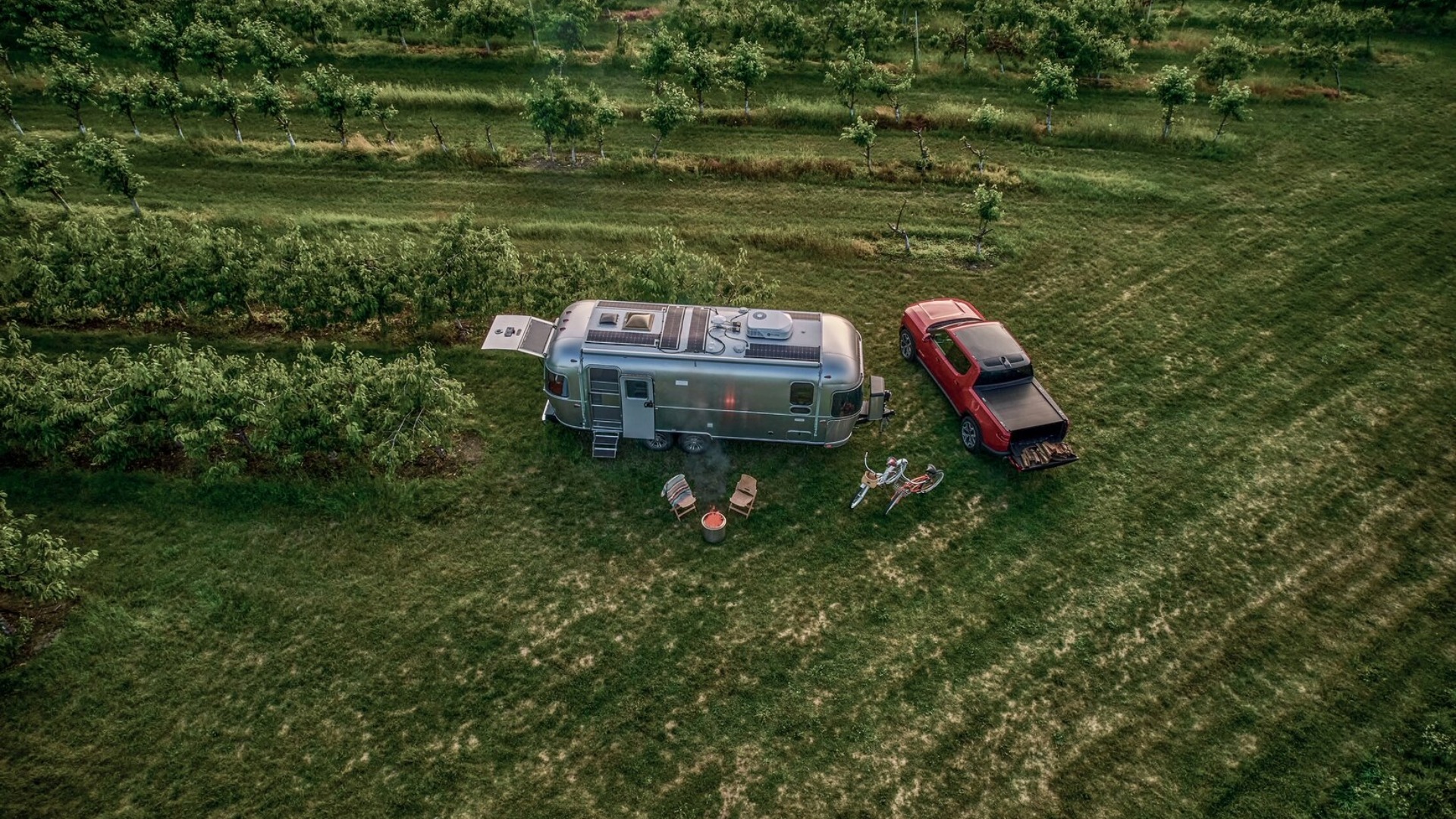 Airstream Trade Wind Travel Trailer boondocking in an open field